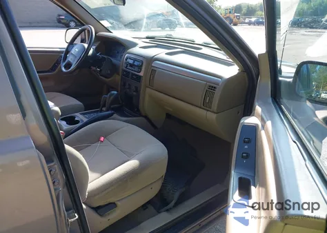 2001 Jeep Grand Cherokee Laredo from USA, damaged, VIN 1J4GW48S31C626727